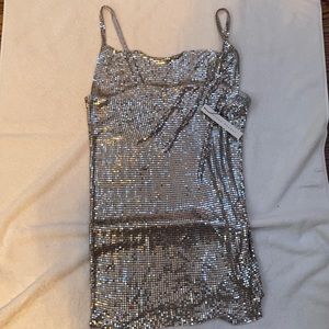 A sequins shirt in perfect condition size medium